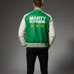 Marty-Supreme-White-and-Green-Varsity-Jacket-Back.webp